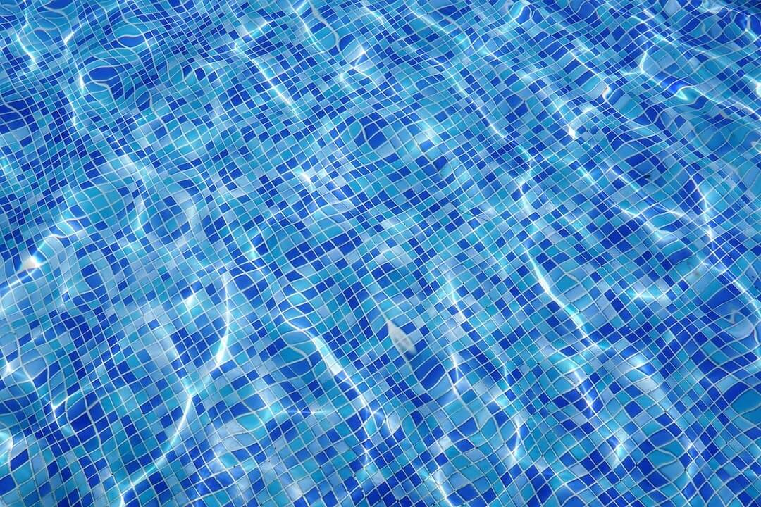 The Florida Climate’s Impact on Pool Water Clarity and Maintenance Timing Image